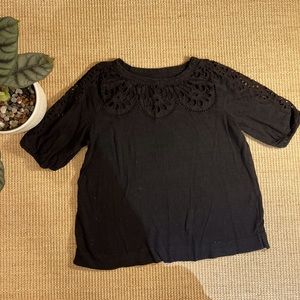 Black shortsleeved eyelet fabric cutouts LOFT top